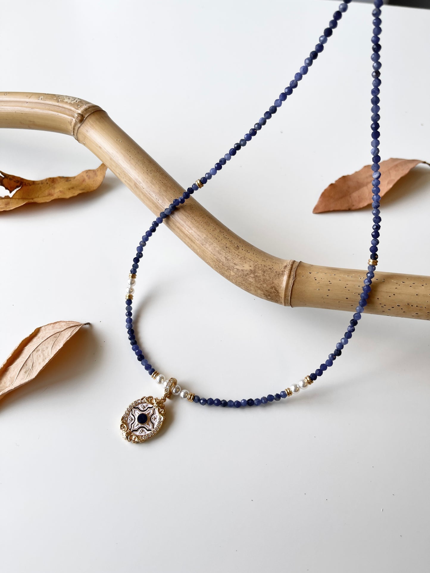 Blue Crystal Necklace with White and Blue Enamel Pendant